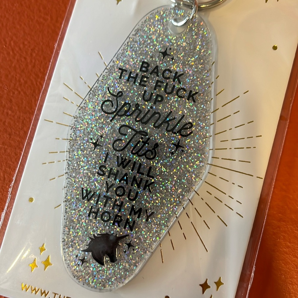 Sparkle Tatas keychain by the playful pineapple